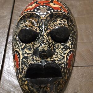Handcrafted Tribal Mask with Black and Red Accents